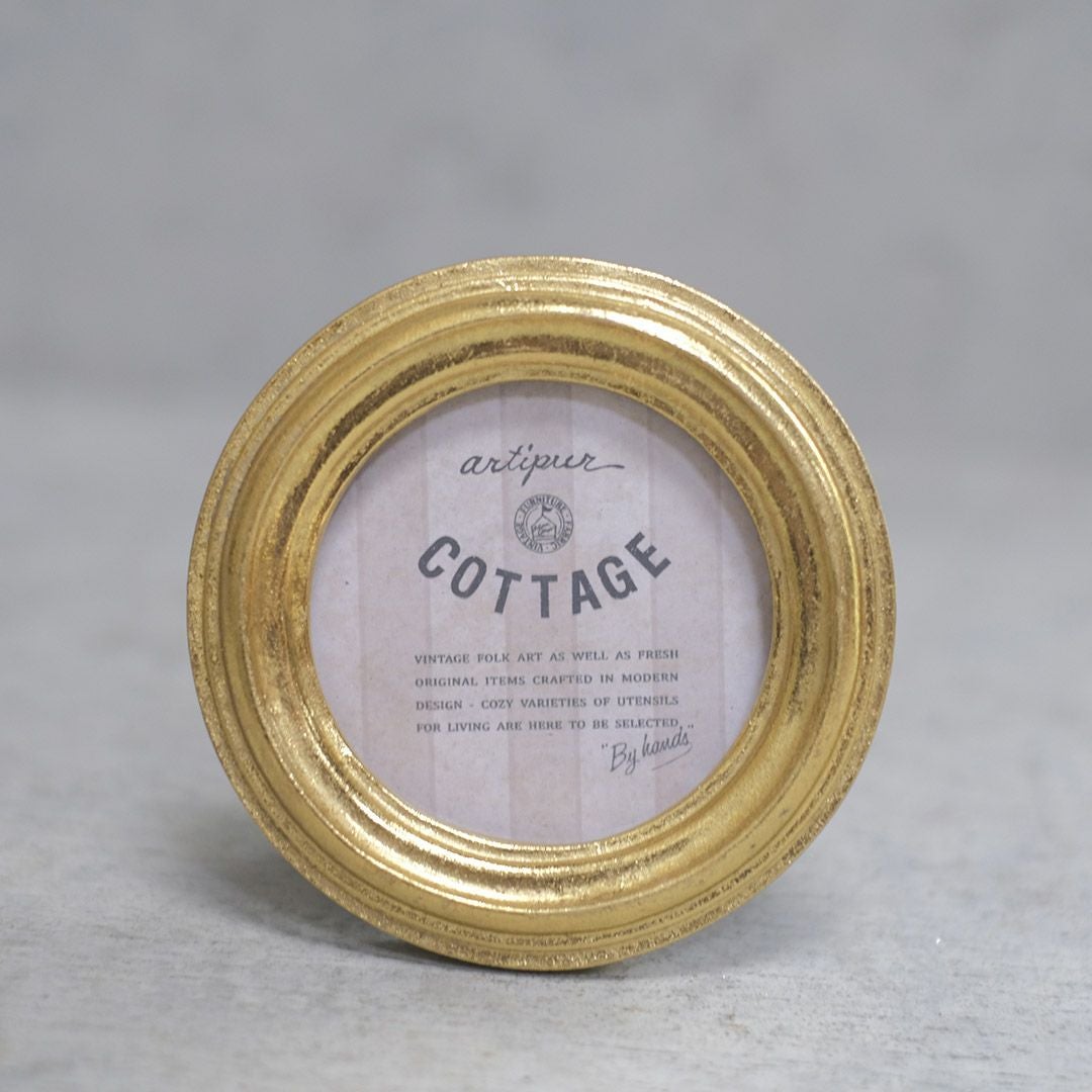 金色の小さな額